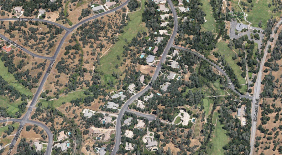 aerial view of tierra oaks estates - homes and golf course showing many homes and golf holes